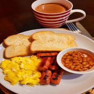 coffee with bread, egg,sausage and baked beans.